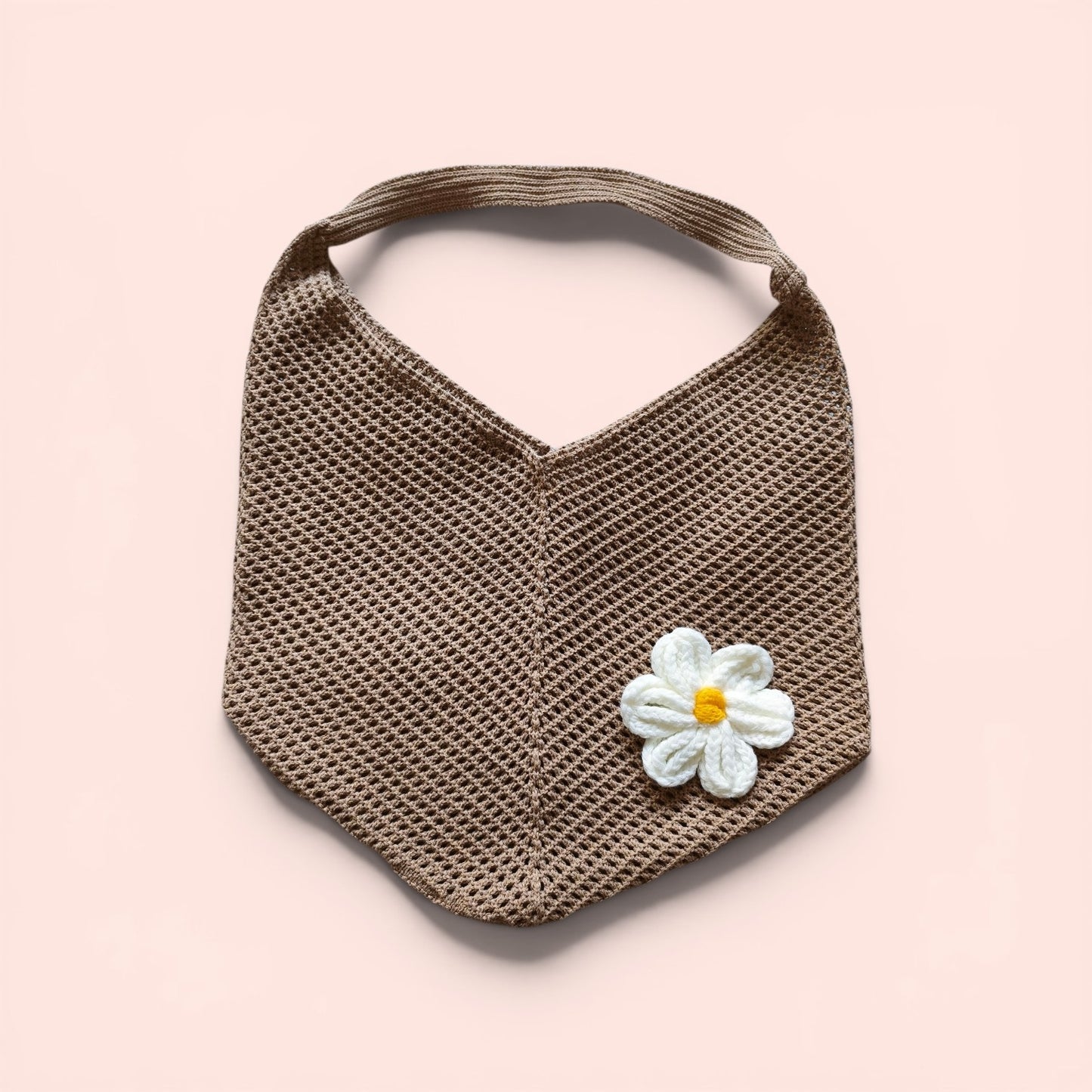 Tan crochet shoulder bag with daisy